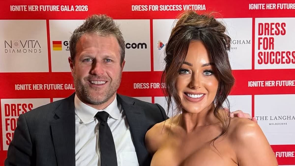 Nathan Buckley's ex-girlfriend Brodie Ryan shows him what he's missing as she busts out of a strapless gown at Melbourne gala and poses with AFL star Campbell Brown