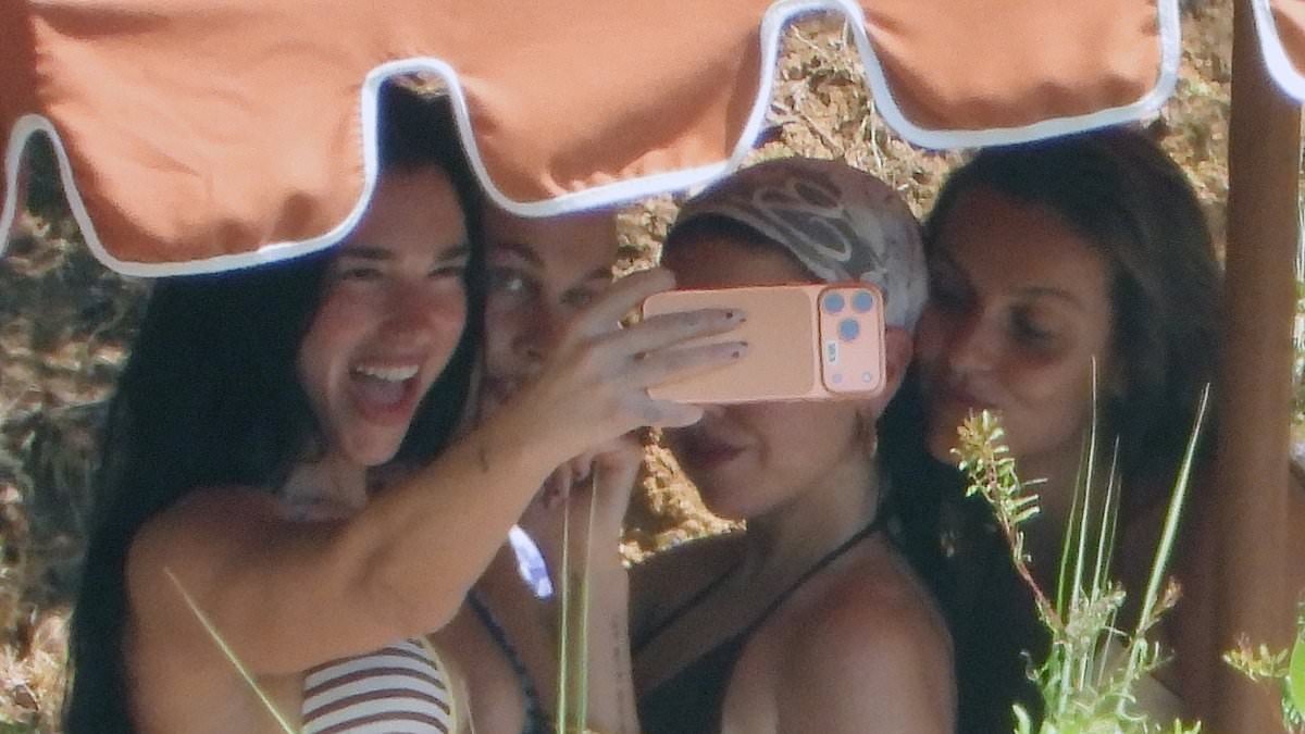 Bikini-clad Dua Lipa takes animated selfies during fun-filled girls' trip for her close pal's hen do in Portofino