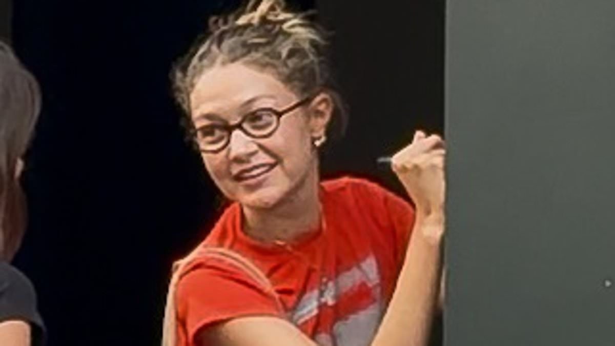 Gigi Hadid, 31, and Bradley Cooper, 51, coordinate their looks as they hide their ring fingers after sparking 'secret' marriage rumours with wedding bands