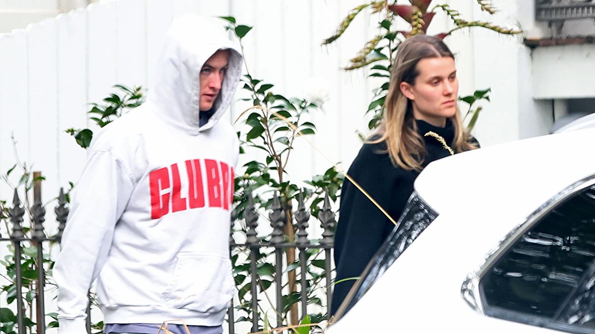 Sydney Swans player Chad Warner seen in tense outing with his stony-faced girlfriend as he breaks cover for the first time since hotel scandal with a strippers - but has a laugh with a mate just hours later