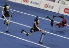 World humanoid robot games show runners breaking records, bursting into flames