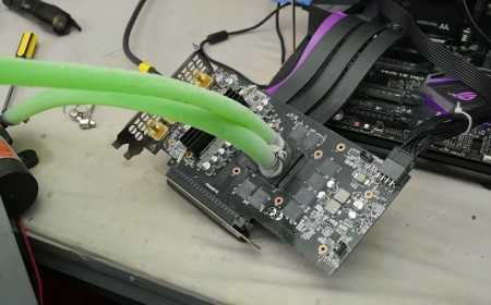 Modder pumps liquid directly over bare GPU silicon via 3D-printed block — drops RTX 2060 Super load temps to 28°C despite initial leaks