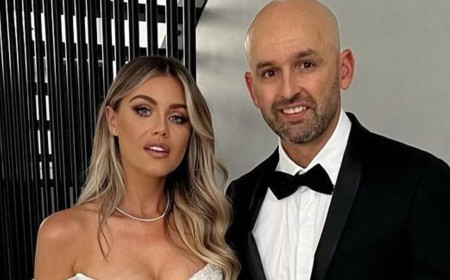 Emma Lyon cuts a stylish figure as she announces she's expecting second child with cricket star husband Nathan