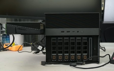 Crazed modder turns NAS into a gaming PC with RTX 5060 hanging from the side, boosts frame rate by 828% — Frankenstein rig hides dedicated PSU in drive bay, breaks Time Spy world record for the onboard CPU