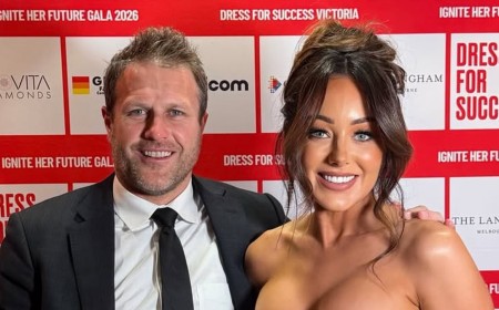 Nathan Buckley's ex-girlfriend Brodie Ryan shows him what he's missing as she busts out of a strapless gown at Melbourne gala and poses with AFL star Campbell Brown