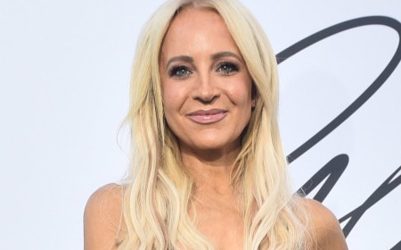Carrie Bickmore faces backlash after she asks a stranger to film her reunion at an airport and criticises him for not doing it properly: 'He's not directing a movie'