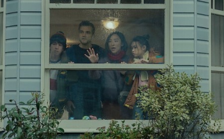 ‘The Last House’ Review: Wagner Moura and Greta Lee Are Locked Inside by the Rain in Ridiculous Netflix Thriller