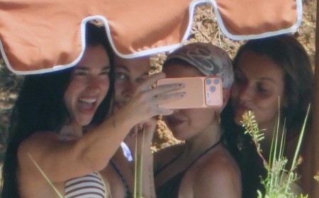 Bikini-clad Dua Lipa takes animated selfies during fun-filled girls' trip for her close pal's hen do in Portofino