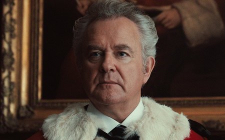 Hugh Bonneville practically dances on Downton Abbey's grave in the new series of Netflix's The Gentlemen as he plays a super-camp toff (with a carefully styled bouffant do)