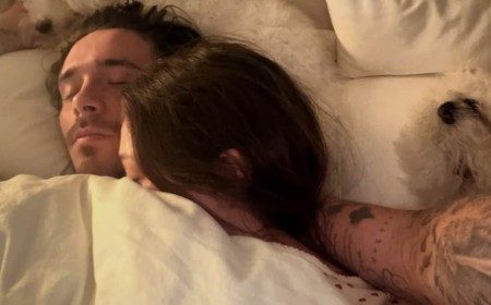 Brooklyn Beckham shares intimate snaps in bed with wife Nicola Peltz as dad David reminisces on 'perfect family dinner' during the clan's luxury European holiday