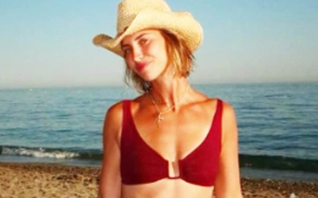 Ferne McCann flaunts her toned abs in a burgundy bikini as she soaks up the sun in Marbella with ex TOWIE co-stars James Argent and Danielle Armstrong