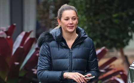 Casual Karl Stefanovic steps out in Ugg boots as his wife Jasmine slips into tight activewear while running errands after she has a spray at a magazine for 'lies' about their recent Europe trip