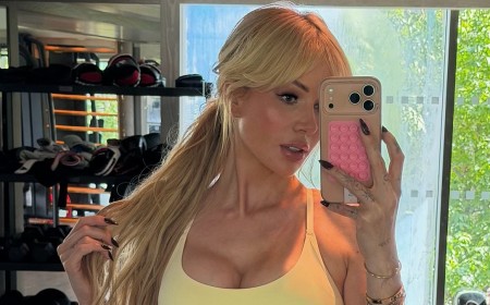 Olivia Attwood shows off her surgically enhanced cleavage in a sports bra after revealing she wants a THIRD boob job following the realisation she 'might not have a baby'