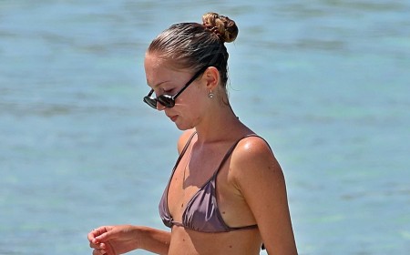 Bikini-clad Lila Moss looks just like her supermodel mum Kate as she takes a dip in the sea with influencer pal Olivia Neill in Formentera