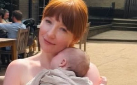 New mum Nicola Roberts, 40, looks radiant as she cuddles up to her baby girl during idyllic afternoon