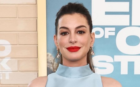 Anne Hathaway, 43, roasted over 'ridiculous' maternity outfit as she shows off baby bump at LA premiere