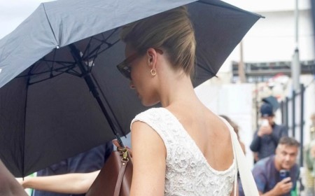 Margot Robbie looks elegant in white as she joins Bradley Cooper and Monica Barbaro on the set of the Ocean's Eleven prequel for the first time