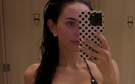 Tess Crosley shows Lachie Neale what he is missing with a sizzling bikini selfie as AFL star debuts new girlfriend following their affair drama