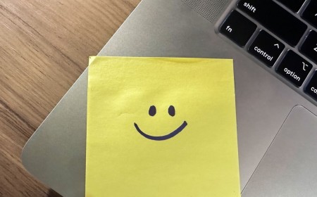 IT department put sticky notes on the laptops to help employees log in