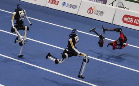 World humanoid robot games show runners breaking records, bursting into flames
