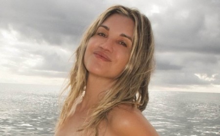 Ashley Roberts, 44, goes topless on the beach before slipping into a black bikini on Barbados getaway with her boyfriend George Rollinson, 26
