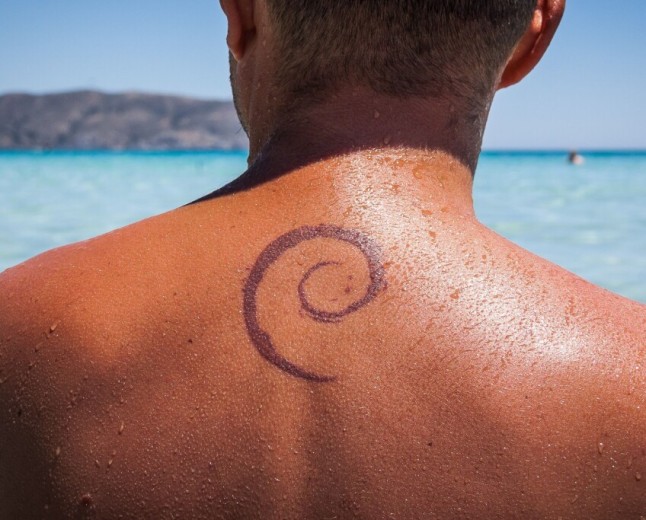 Debian votes to let contributors code with AI