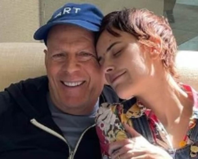 Dementia-stricken Bruce Willis, 71, appears in rare photo at daughter Tallulah's wedding… four years after Hollywood retirement due to health battle