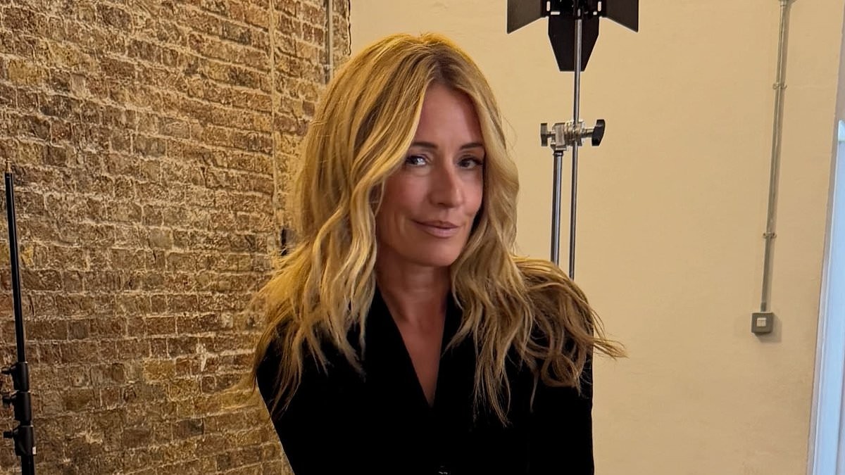 Cat Deeley poses cross-legged in a blazer minidress and jokes 'all you need is a bar stool and a leaf blower'