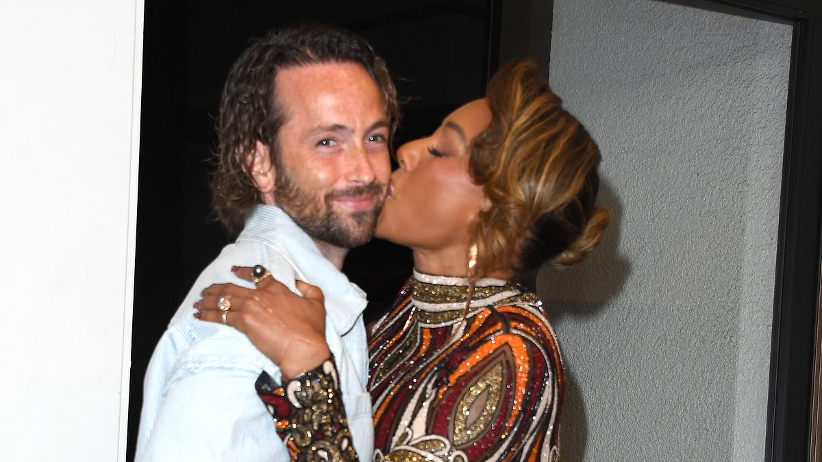 Mel B, 51, plants a kiss on husband Rory McPhee, 38, as she enjoys some backstage PDA at America's Got Talent final