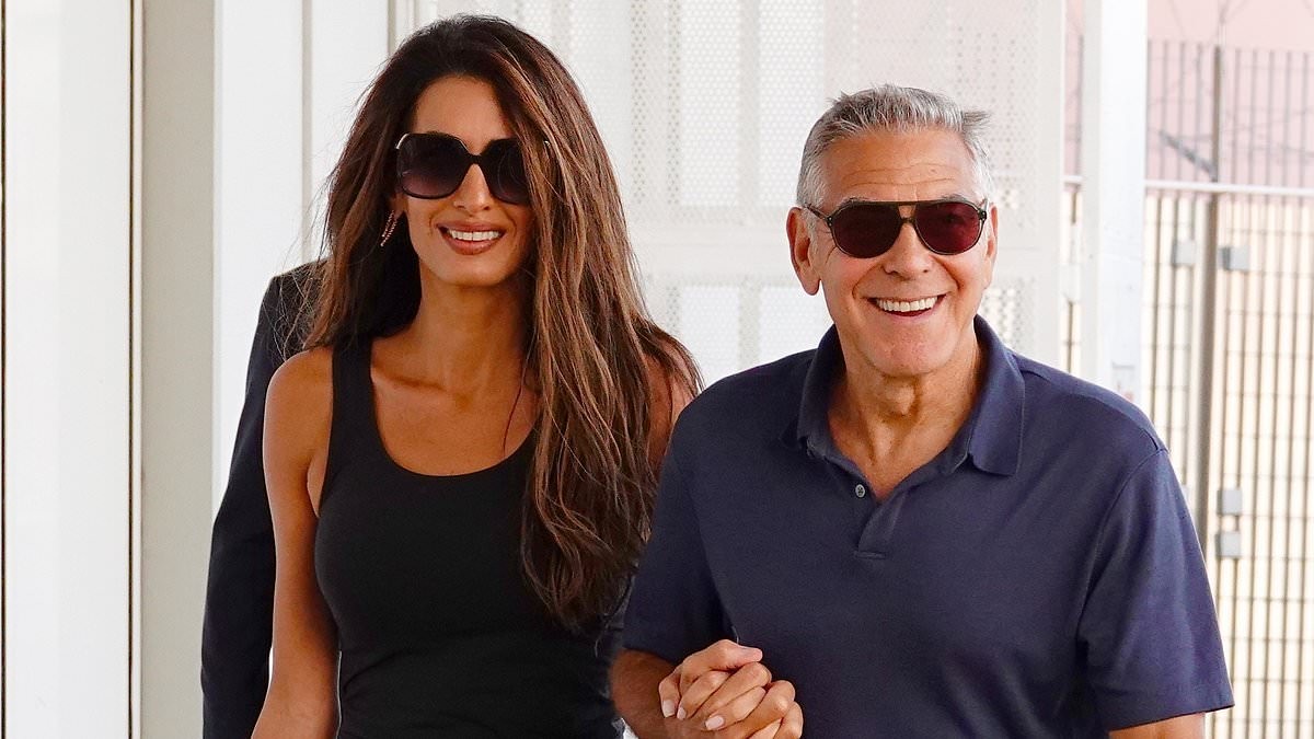 Amal Clooney wows in £1,695 snake print Elie Saab skirt as she links arms with husband George Clooney as they leave the 83rd Venice Film Festival