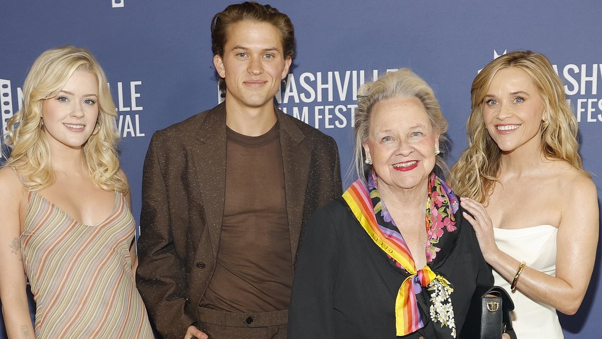 Reese Witherspoon looks much younger than age 50 as she poses with her mini-me daughter, son AND mother at premiere in Nashville