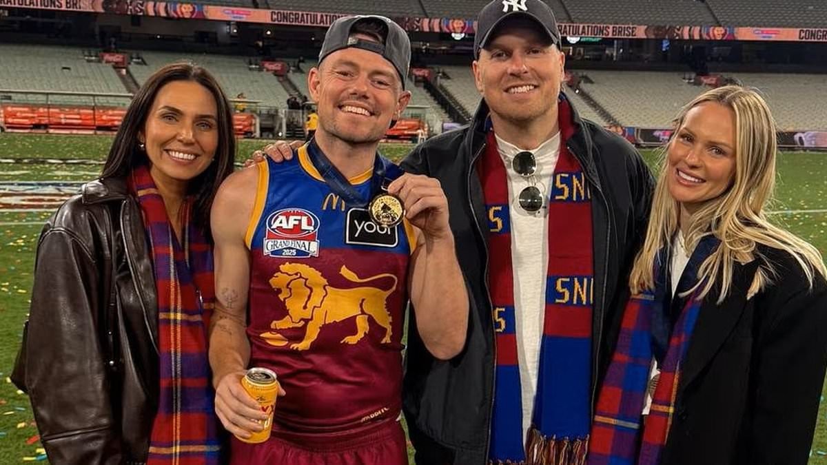 Jules Neale shows her true colours by supporting ex-husband Lachie Neale's rival team Fremantle at the 2026 AFL Grand Final