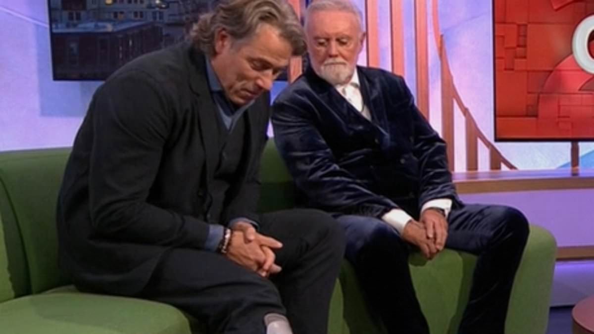 John Bishop makes TV appearance wearing a medical boot as he shares update after breaking his ankle in motorbike crash and cancelling tour