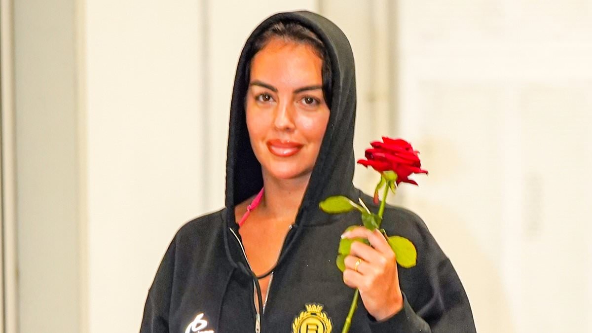 Newlywed Georgina Rodriguez clutches a red rose as she leaves Venice in a £1,000 Balenciaga hoodie