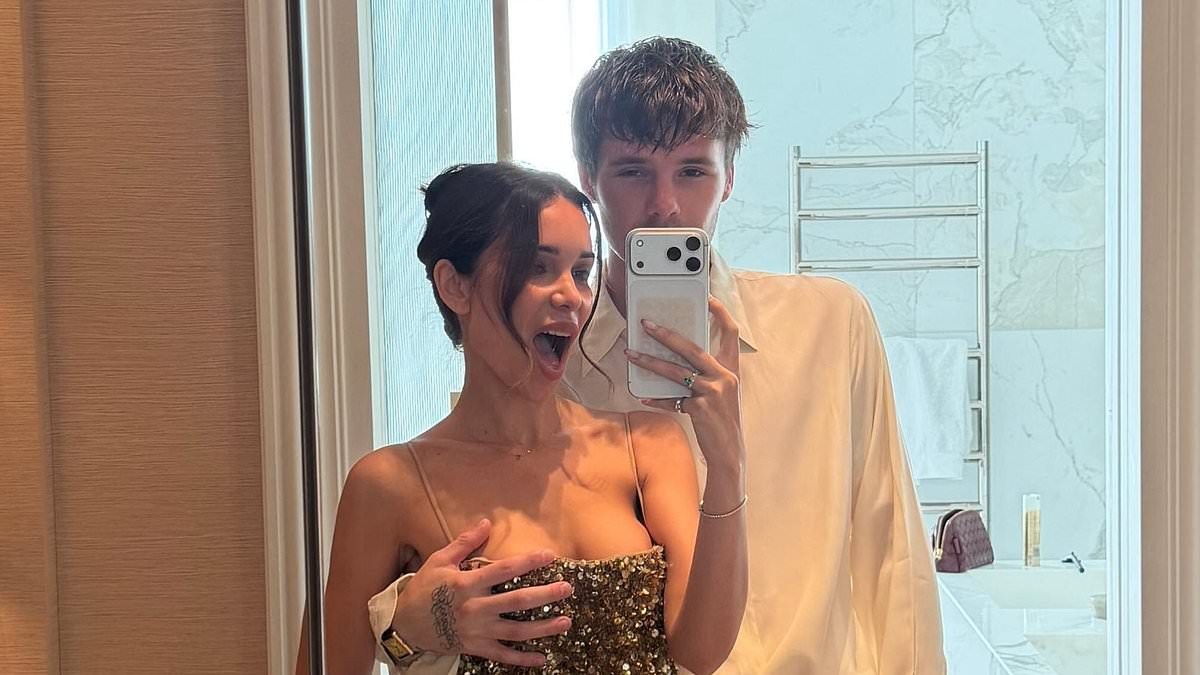 Cruz Beckham, 21, shares cheeky snap as he paws at girlfriend Jackie Apostel, 30, ahead of glam night out
