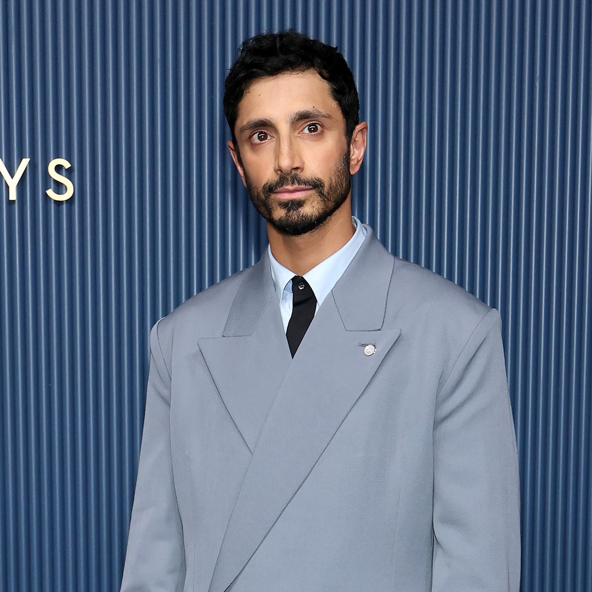Riz Ahmed Reacts to Getting Tom Cruise's “Bangin’” Coconut Cake