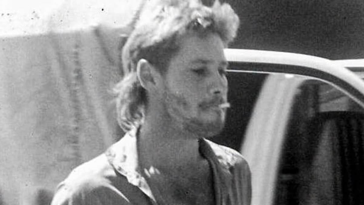 Robert Irwin is the spitting image of his late dad Steve as never-before-seen photos surface of the crocodile hunter sporting a mullet and smoking a cigarette
