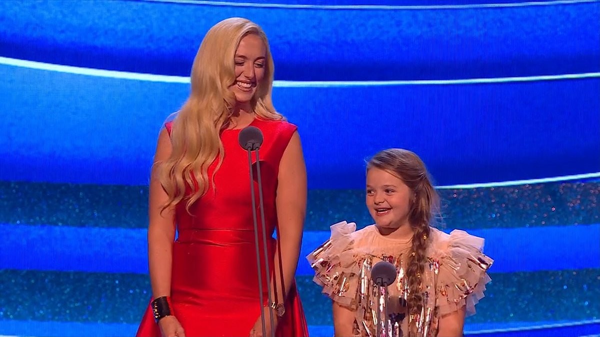 Valencia Fury, 8, makes her NTAs debut with her mother Paris as she is branded an 'icon' by viewers after becoming the star of their family show