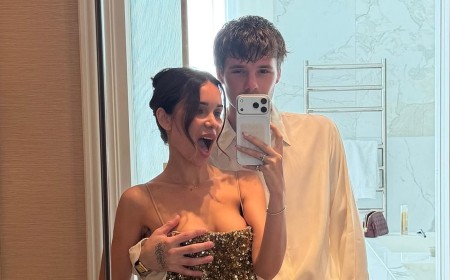 Cruz Beckham, 21, shares cheeky snap as he paws at girlfriend Jackie Apostel, 30, ahead of glam night out