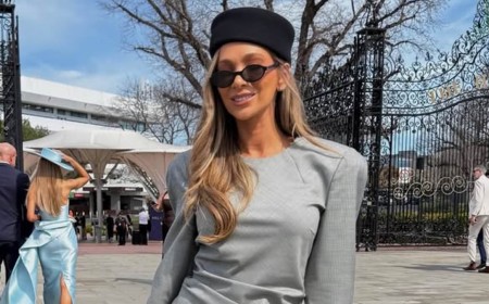 Queen bee AFL WAGS in a close-knit clique attend Melbourne races - as Nadia Bartel looks loved-up with her handsome partner and Bec Judd stuns in baby blue