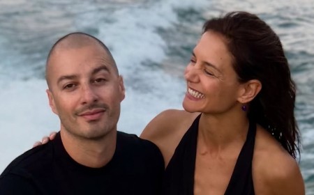 Katie Holmes, 47, slips into tiny white bikini on romantic boat ride with boytoy Jason Bard Yarmosky, 39, during Lake Como getaway