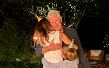 Richard Gere cuddles up to much-younger wife and six-year-old son as he celebrates 77th birthday