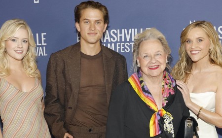 Reese Witherspoon looks much younger than age 50 as she poses with her mini-me daughter, son AND mother at premiere in Nashville