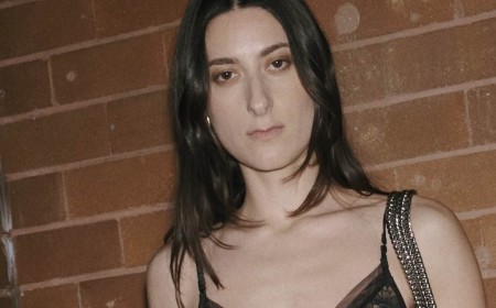 Daughter of one of Australia's most famous fashion designers - 'Queen of jeans' Bettina Liano - steps out on the Sydney social scene in a daring sheer top