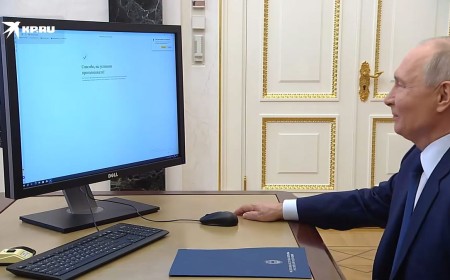Putin casts online vote using unlicensed Windows on an American Dell PC — 'Activate Windows' watermark visible in official Kremlin clip, uses foreign Dell PC despite Russian tech mandate