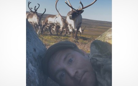 Photographer Hides Behind Rock as Herd of 400 Wild Reindeer Comes Charging at Him
