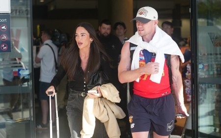 Lachie Neale has girlfriend Emma Field by his side as he returns home after AFL Grand Final win - following her VERY public support for her new man