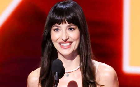 Dakota Johnson gives rumored beau MGK an eyeful as she goes BRALESS under nude sequin gown at VMAs