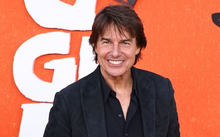 Tom Cruise looks every inch the leading man in a sharply tailored suit as he joins Jessica Alba and Emma D'Arcy at star-studded Digger premiere in LA