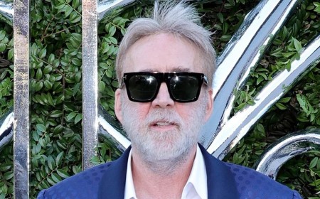 Nicolas Cage, 62, looks unrecognizable with full gray hair and beard as he makes rare red carpet appearance with much-younger wife